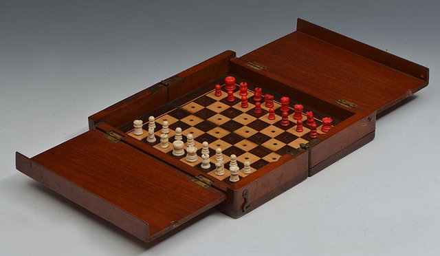 Appraisal: A LATE TH EARLY TH CENTURY MAHOGANY CASED TRAVELLING CHESS