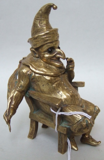 Appraisal: A brass figural inkwell late th century modelled as Punch