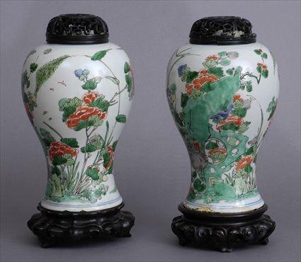 Appraisal: PAIR OF FAMILLE VERTE PORCELAIN BALUSTER-FORM JARS Each with iron