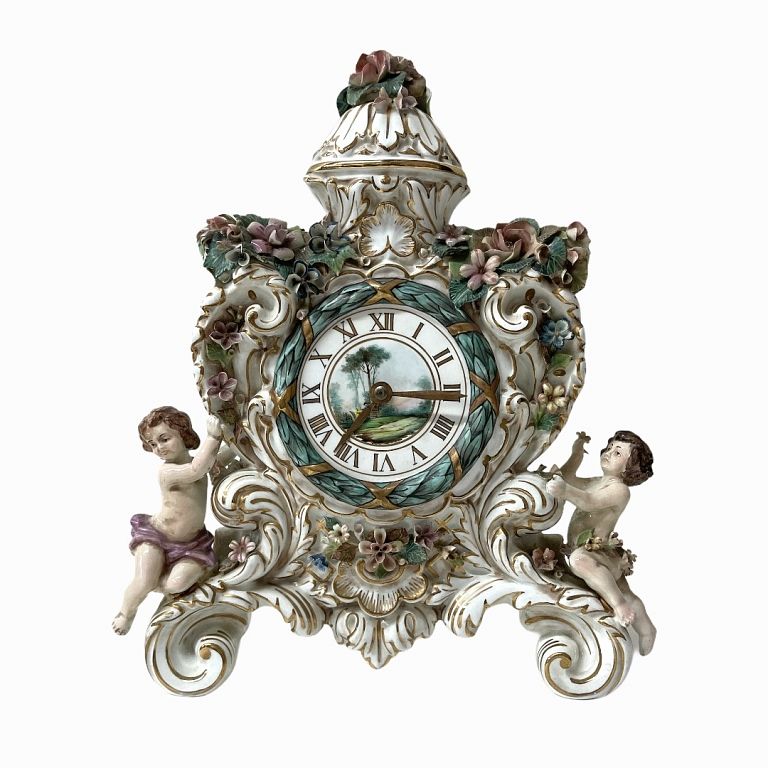 Appraisal: Spaniard Porcelain Table Clock Spaniard Porcelain Table Clock Marked Measures