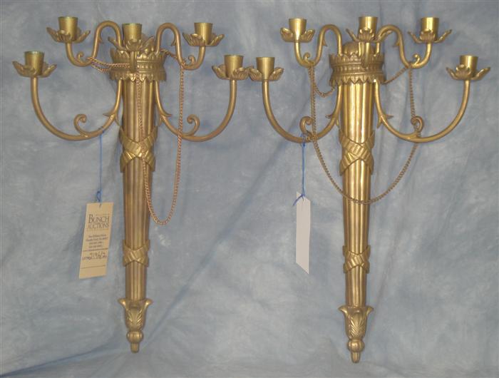 Appraisal: Pair of brass torch form wall sconces h Estimate -