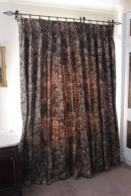 Appraisal: A PAIR OF BEIGE GROUND INTERLINED CURTAINS with a detailed