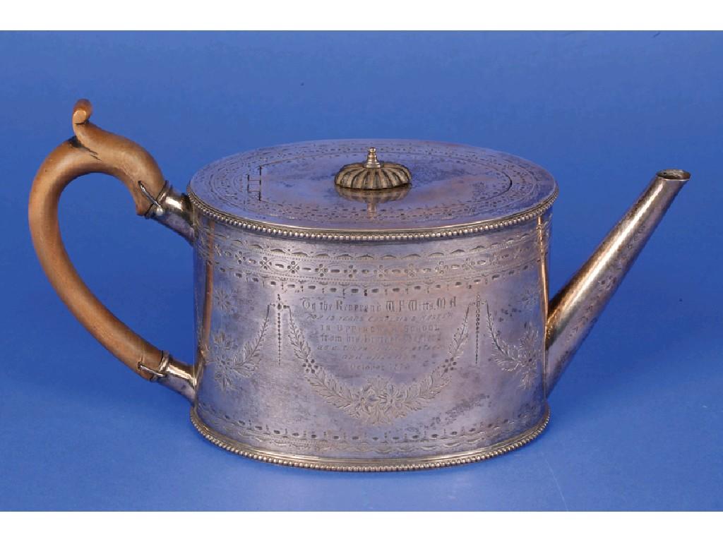 Appraisal: A VICTORIAN TEAPOT of oval form with wooden scroll handle