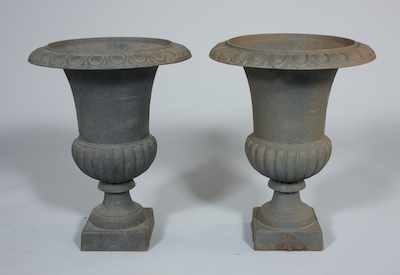 Appraisal: A Pair of Iron Garden Urns Pair of iron garden