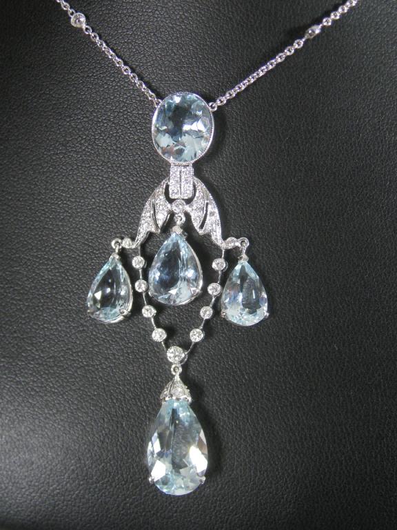 Appraisal: An Edwardian style Aquamarine and Diamond Necklace the central oval