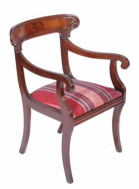 Appraisal: A GEORGE IV MAHOGANY ARMCHAIR with scroll back carved acanthus