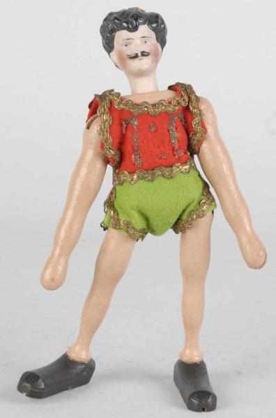 Appraisal: Schoenhut Male Acrobat Figure Description Jointed arms legs and bisque