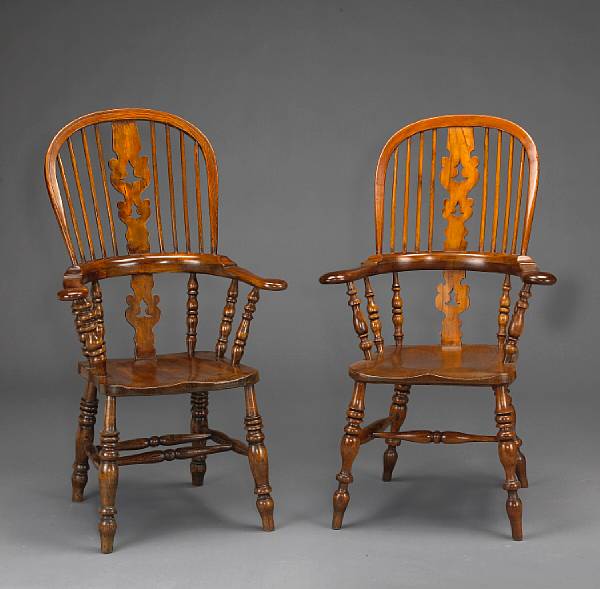 Appraisal: An assembled set of twelve Windsor oak and elm armchairs