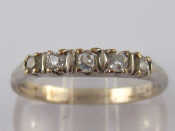 Appraisal: A white metal tests ct gold five stone diamond ring