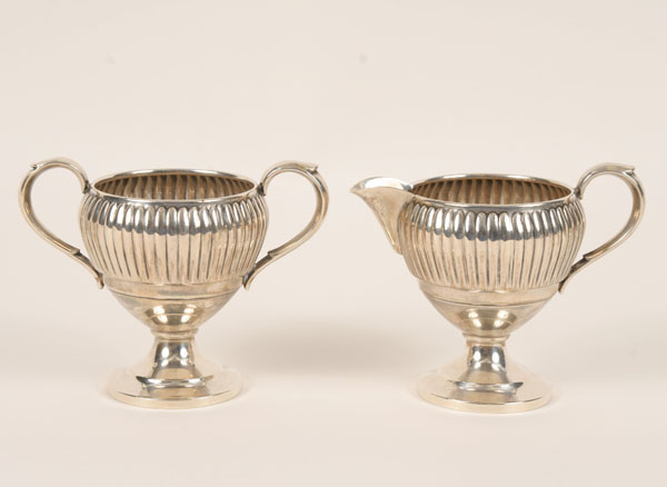 Appraisal: Fisher Silversmiths sterling creamer and sugar Ribbed upper bodies with