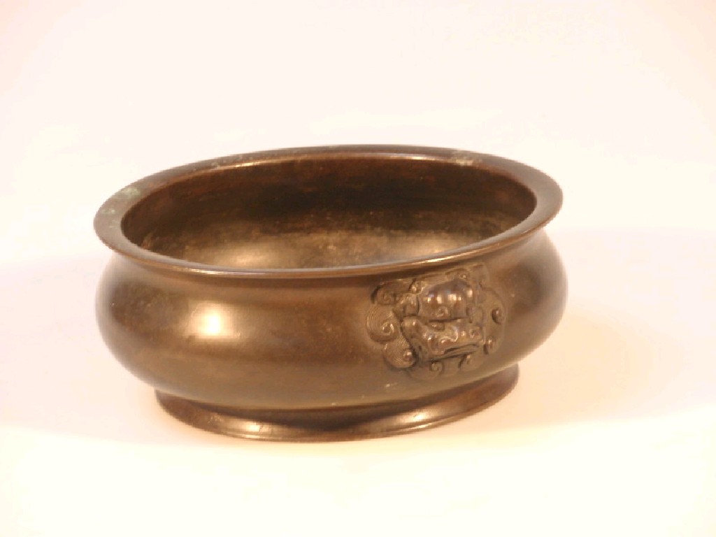 Appraisal: An thC Chinese bronze bomb censer mounted with two Buddistic