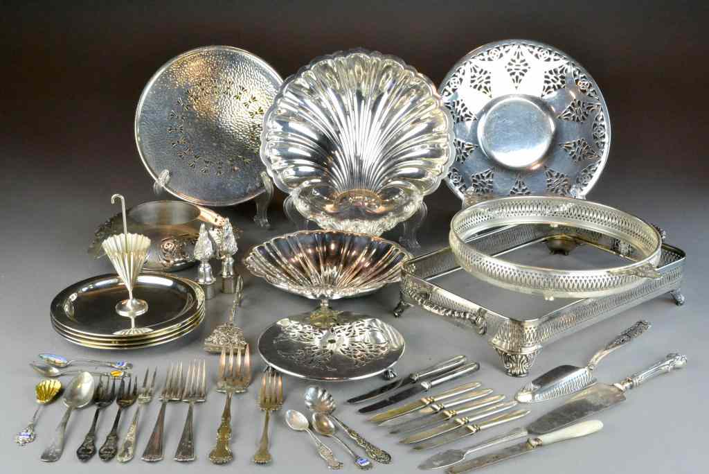 Appraisal: Pcs Silver Plated TablewareTo include pierced serving trays and trivets