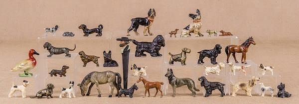 Appraisal: Twenty-eight cast iron spelter and metal dogs Twenty-eight cast iron