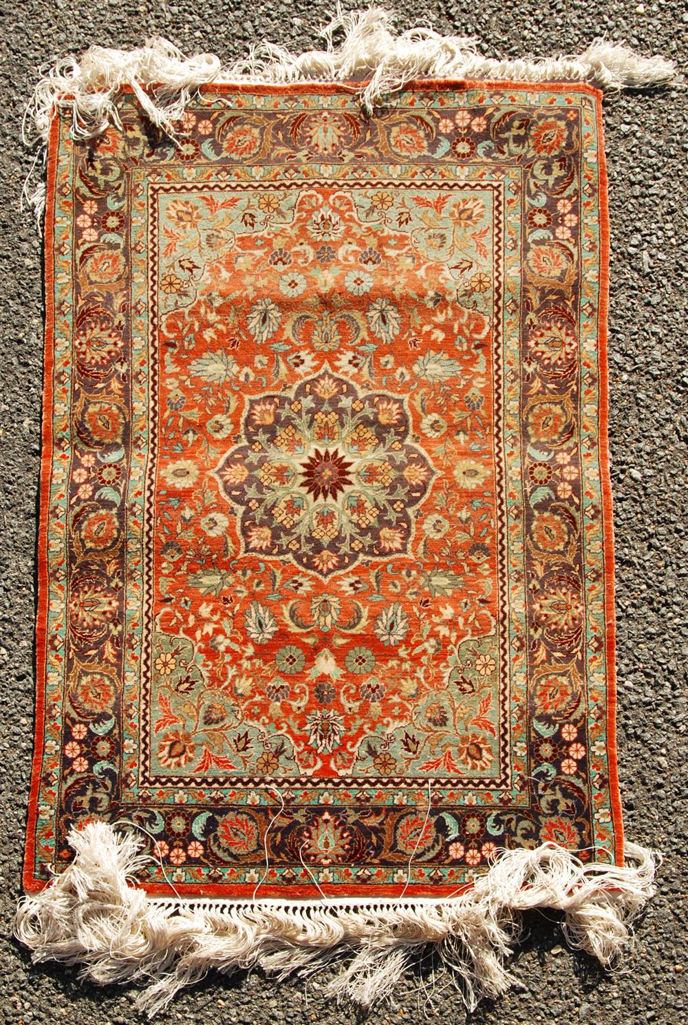 Appraisal: SMALL CHINESE SILK MEDALLION RUG WITH SILK FRINGE having a