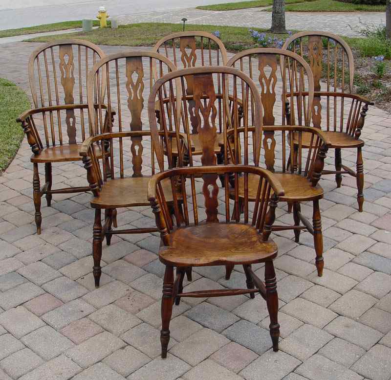 Appraisal: SET OF ENGLISH WINDSOR CHAIRS Classic English bow back continuous