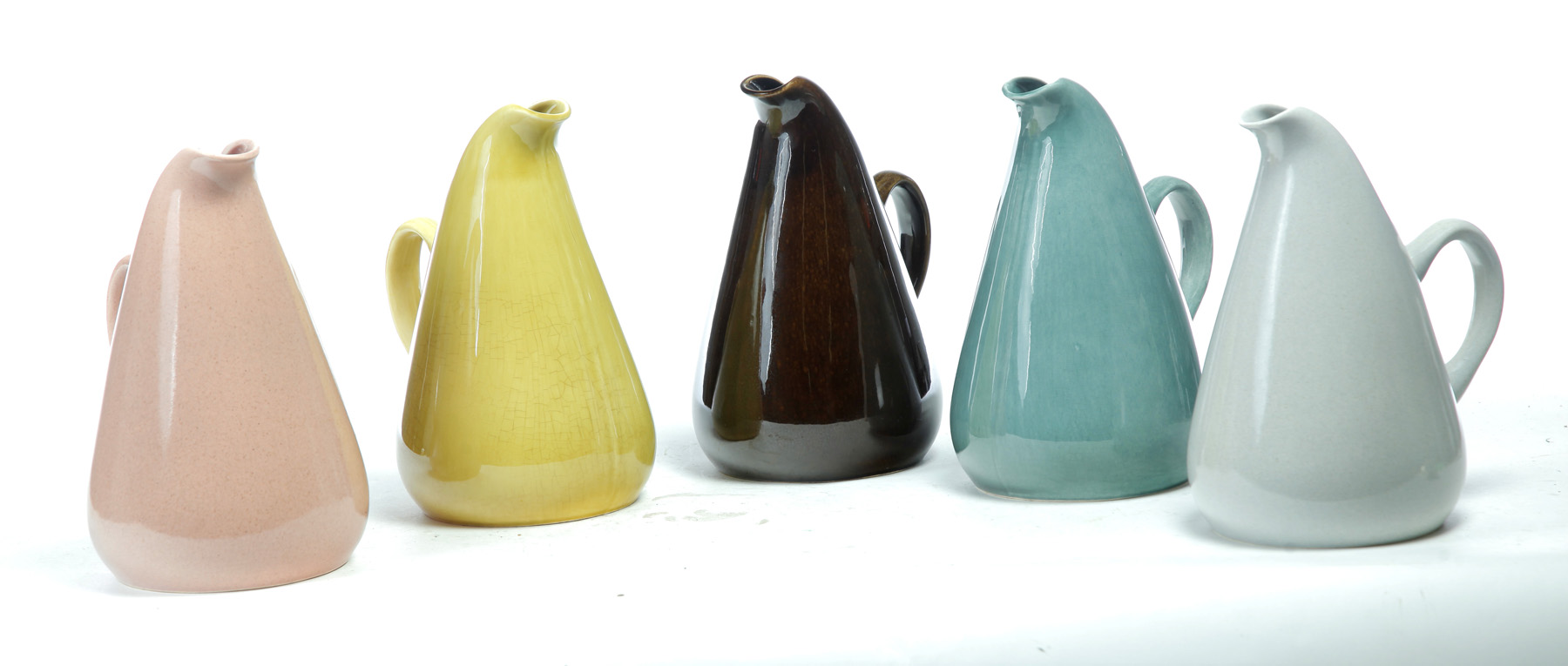 Appraisal: FIVE WATER PITCHERS BY RUSSEL WRIGHT FOR STEUBENVILLE POTTERY CO