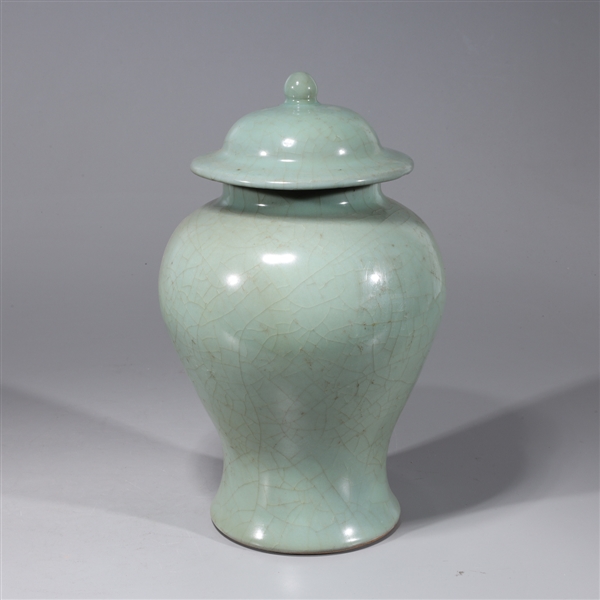 Appraisal: Chinese celadon glazed covered porcelain vase overall good condition minor