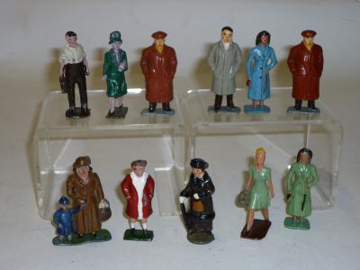 Appraisal: Eleven metal figures various factories appropriate for train passengers bus