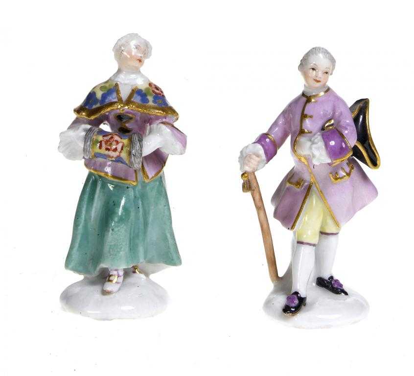 Appraisal: A PAIR OF MEISSEN MINIATURE FIGURES OF A LADY AND