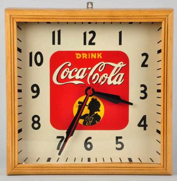 Appraisal: Wood-Framed Coca-Cola Electric Clock Circa Bright and clean face and