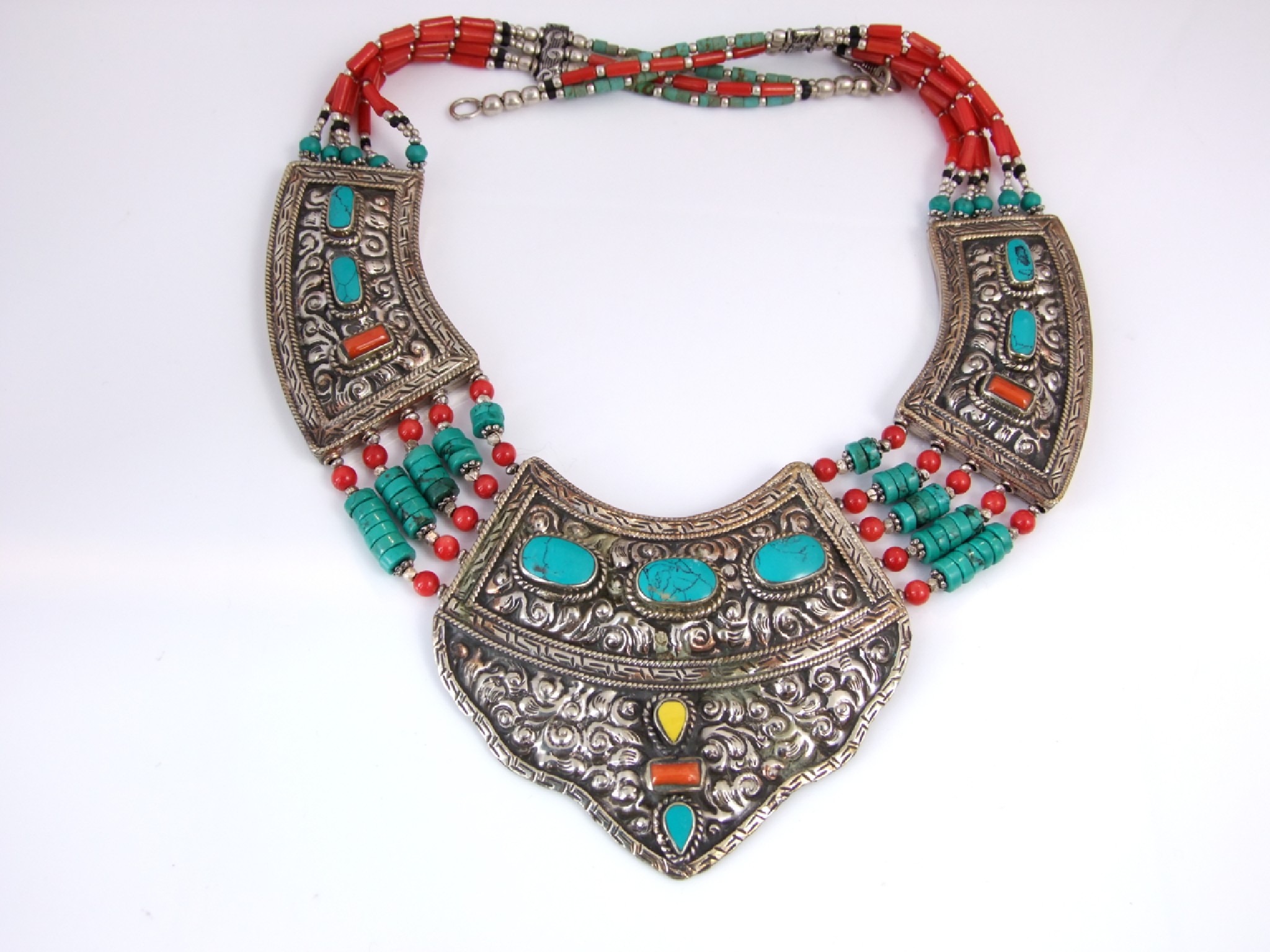 Appraisal: A white metal turquoise and coral set bib style necklace