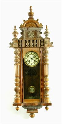 Appraisal: A walnut and beech Vienna style regulator by Gustav Becker