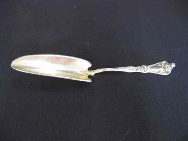 Appraisal: Manchester Sterling Silver Cheese Scoop fancy poppy handle gold wash