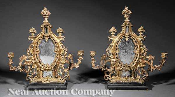 Appraisal: A Pair of American or English Rococo Brass Four-Light Girandoles