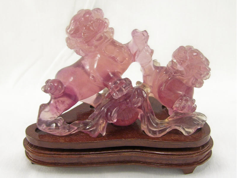 Appraisal: Carved Fluorite Lions on Stand Carved Oriental style purple fluorite