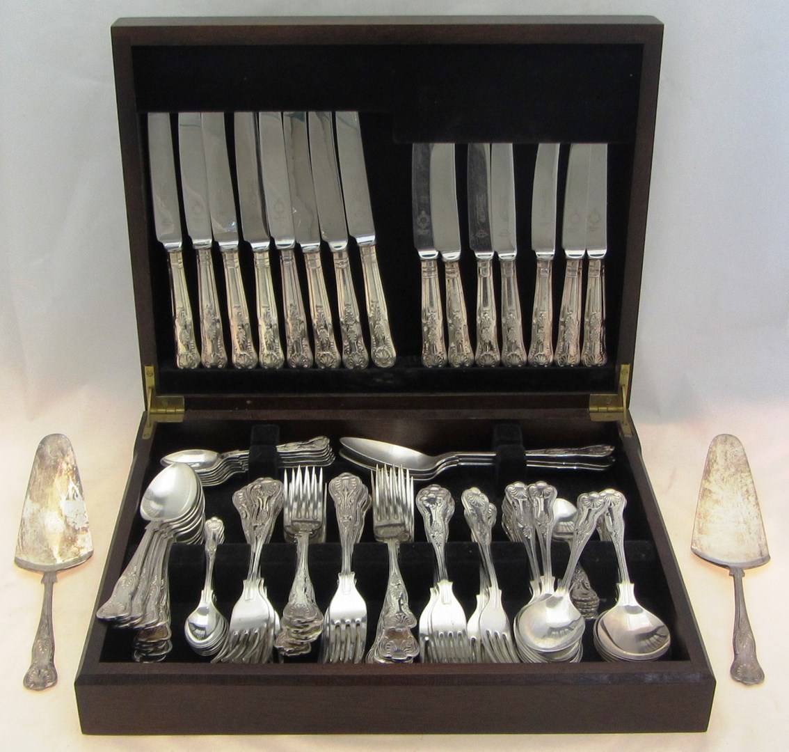 Appraisal: A quantity of King's pattern plated table flatware including knives