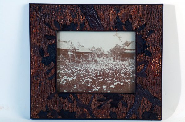 Appraisal: Japanese frame of tree bark with inlay designs of flowers