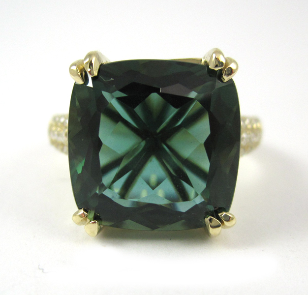 Appraisal: GREEN FLUORITE AND DIAMOND RING The k yellow gold ring