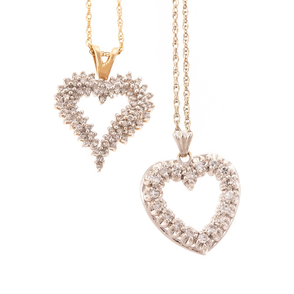 Appraisal: A Pair of Open Heart Diamond Pendants in K K