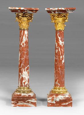 Appraisal: Pair Corinthian column pedestals each with variegated rose marble and