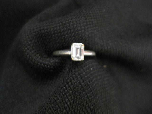 Appraisal: Diamond Platinum Solitaire Ring emerald cut diamond weighing carat in