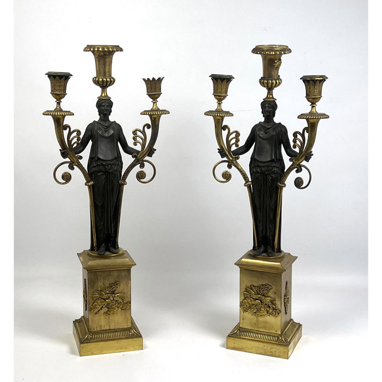 Appraisal: Pr Antique French Empire Bronze Candelabra Elegant female in gown