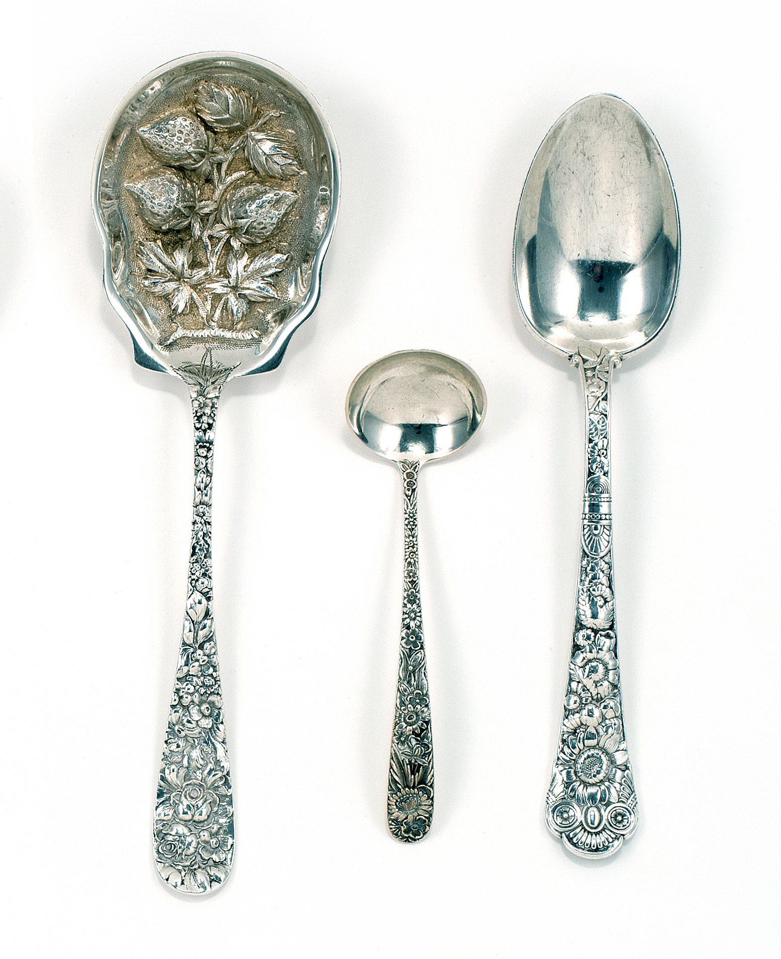 Appraisal: THREE STERLING SILVER SERVING ITEMS A Kirk Sons sauce ladle