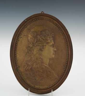 Appraisal: A Bronze Oval Portrait Plaque Oval shape plaque with a