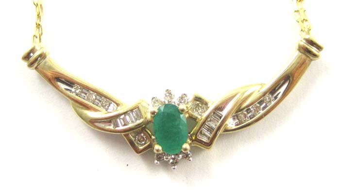 Appraisal: EMERALD DIAMOND AND TEN KARAT GOLD NECKLACE between two equal