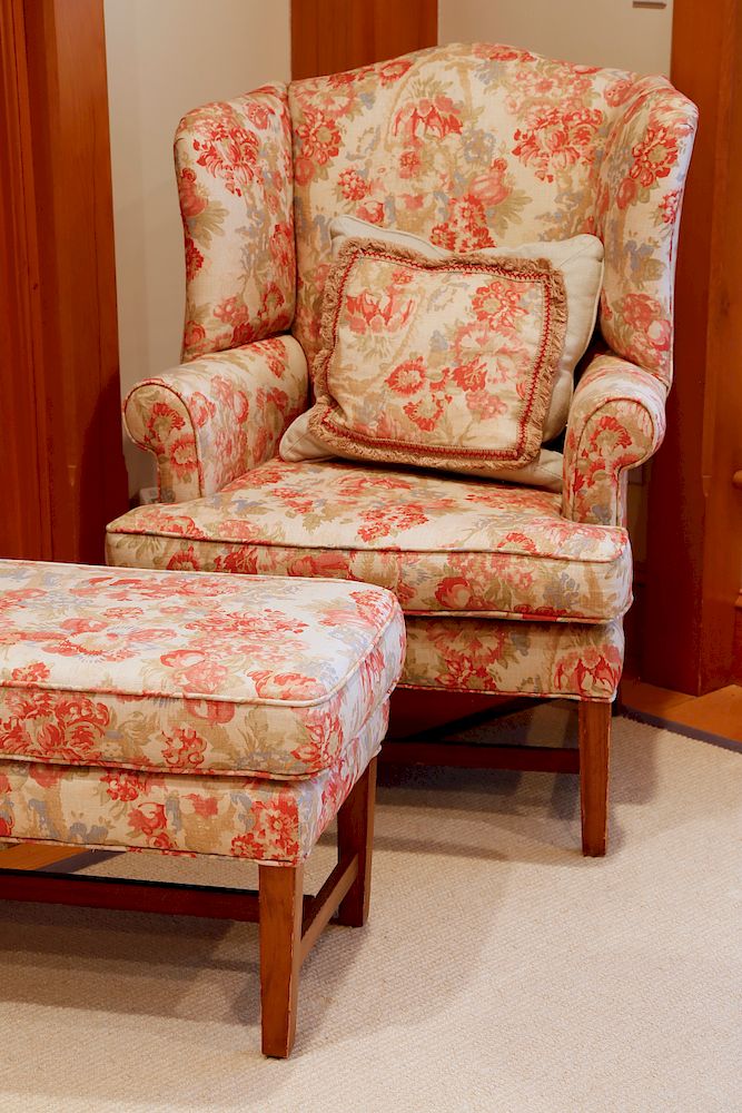 Appraisal: Wing Chair and Ottoman Upholstered in Floral Linen Exclusive on