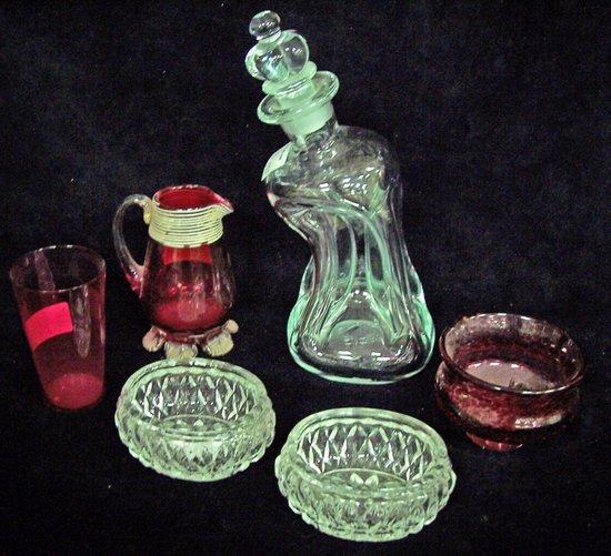 Appraisal: An hourglass shaped decanter and stopper and sundry decorative glass