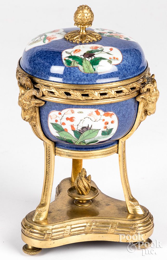 Appraisal: Continental brass and porcelain covered urn Continental brass and porcelain