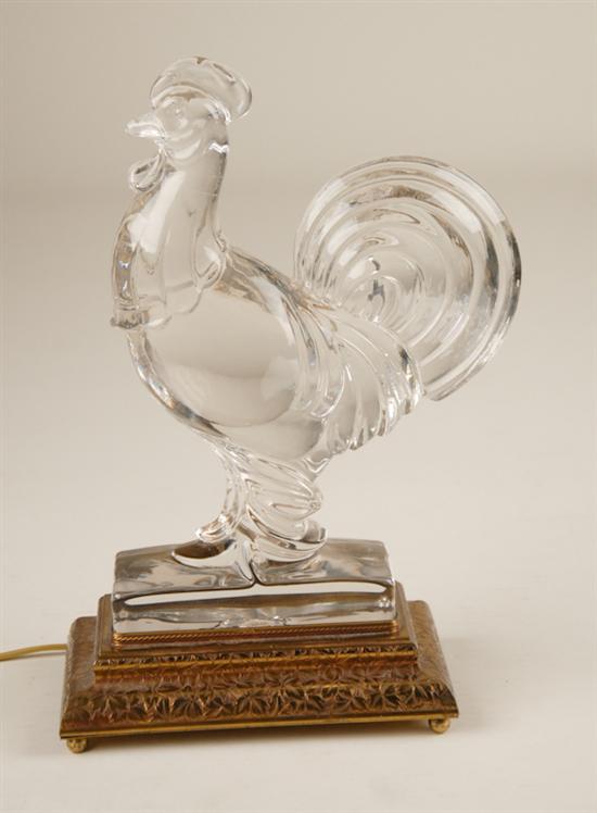 Appraisal: A Glass Rooster Light the foliate chased brass base with