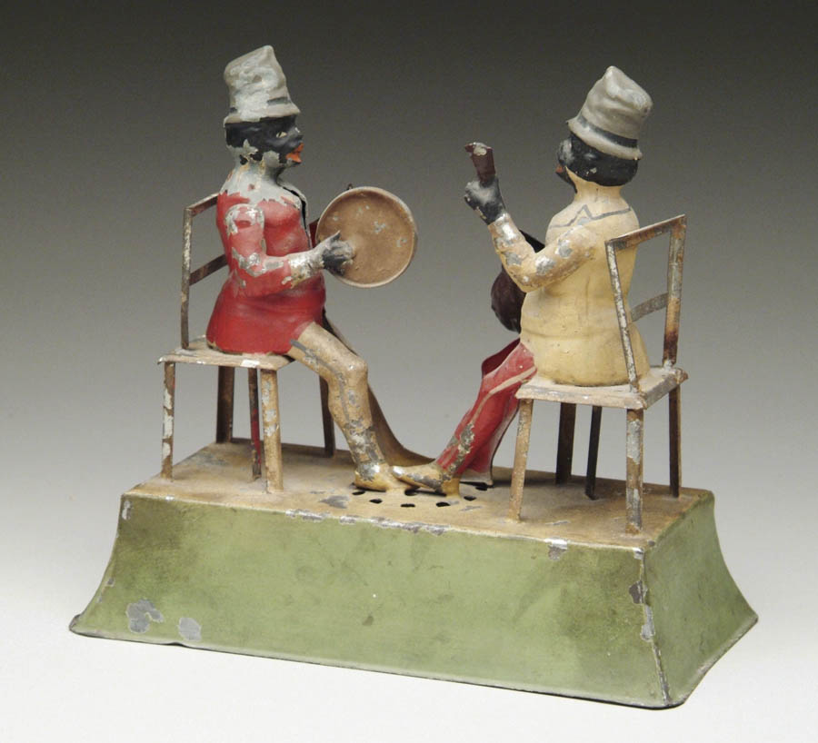 Appraisal: GUNTHERMAN HAND PAINTED MUSICIANS Two black musicians sitting on chairs