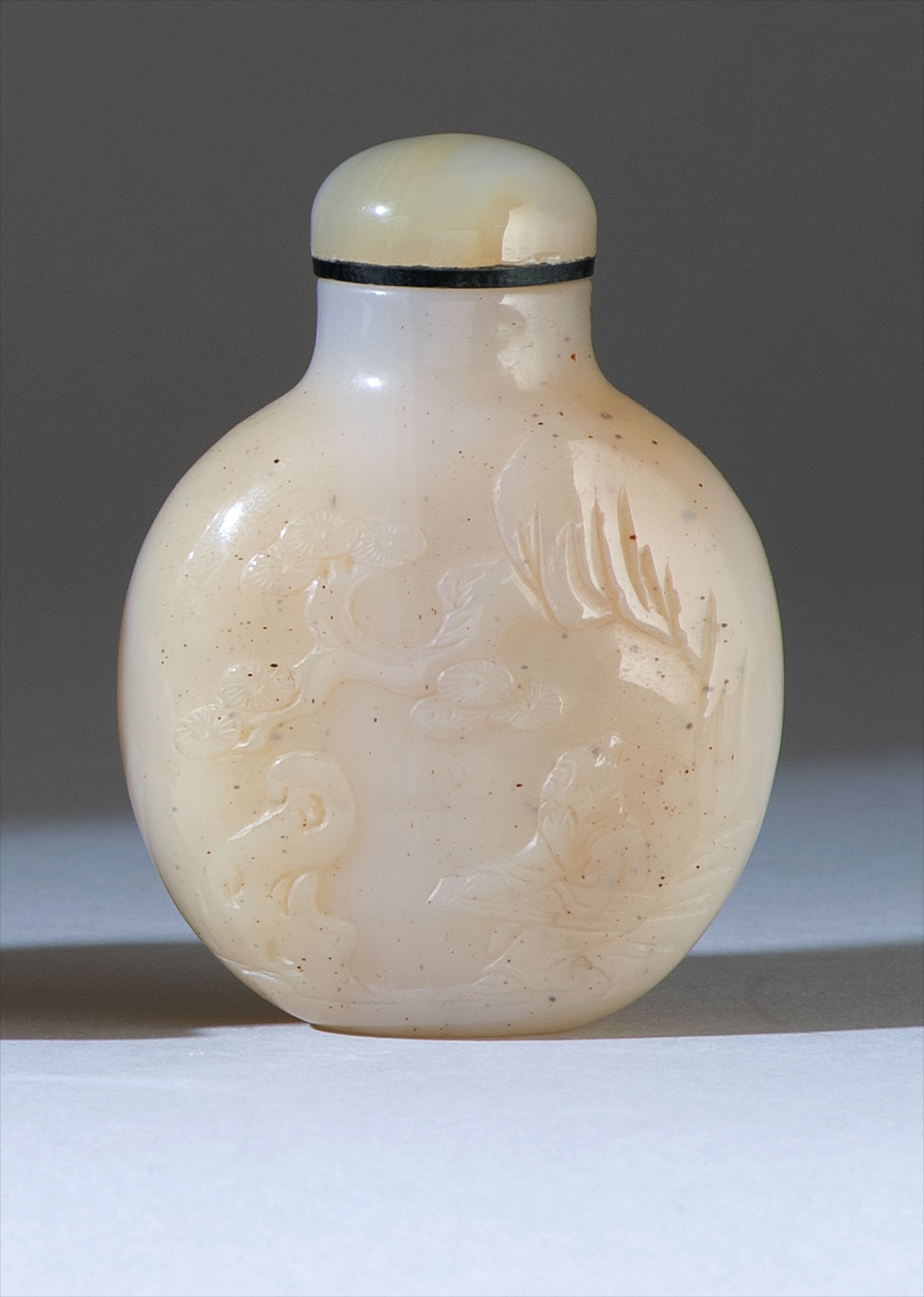 Appraisal: CHALCEDONY AGATE SNUFF BOTTLE th CenturyIn ovoid form Carved on