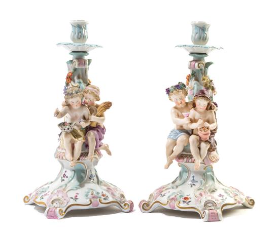 Appraisal: Sale Lot A Pair of Continetal Porcelain Figural Candlesticks attributed