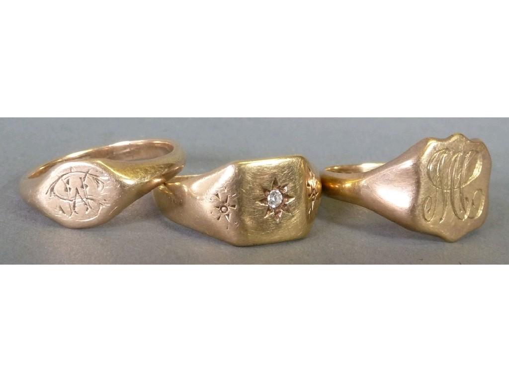 Appraisal: THREE ct GOLD SIGNET RINGS one set with a small