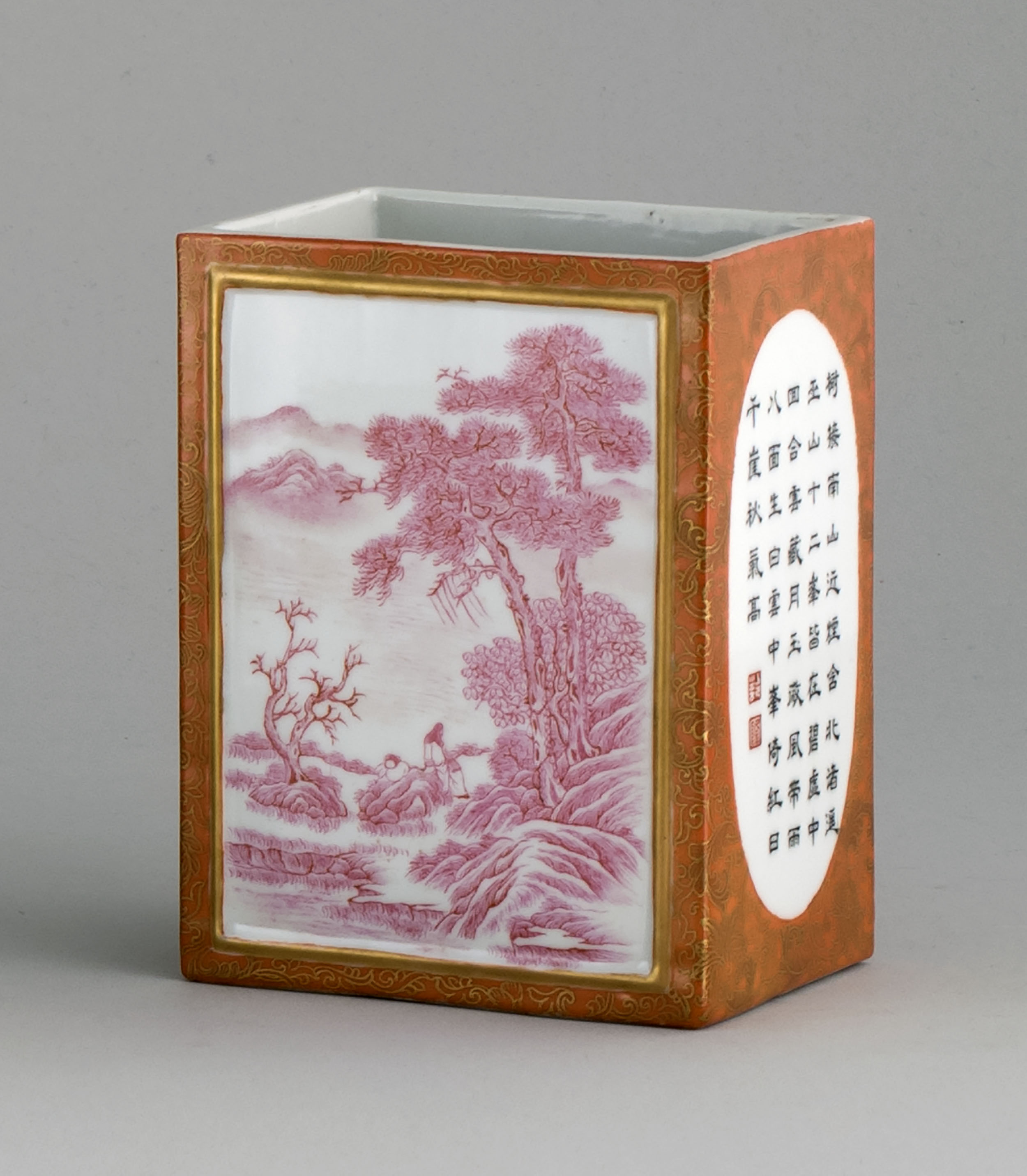 Appraisal: PORCELAIN BRUSH POT In rectangular form with rose-colored landscape scenes