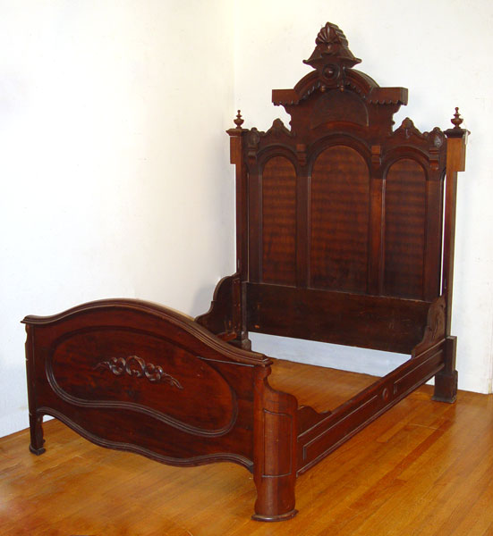 Appraisal: CARVED VICTORIAN ROCOCO REVIVAL TALL BED Carved crest and burl