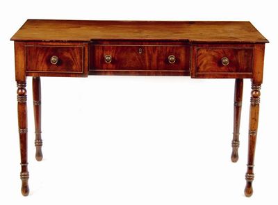 Appraisal: An early th century mahogany inverted breakfront side table with